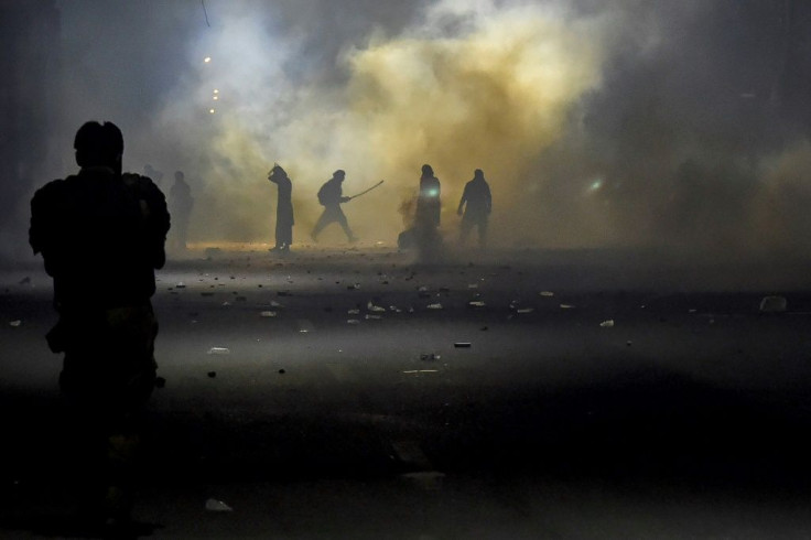 Clashes in Lahore left two police officers dead on Friday