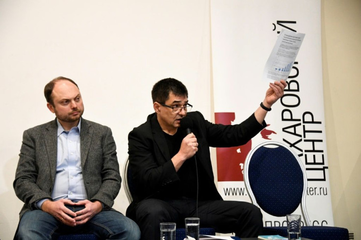 Russian activist Sergei Davidis (R) said the numbers of political prisoners in Russia have been growing steadily every year recently