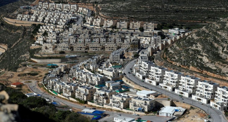 Construction work is pictured on January 21, 2021 in the Israeli settlement of Givat Zeev, near the Palestinian city of Ramallah in the occupied West Bank
