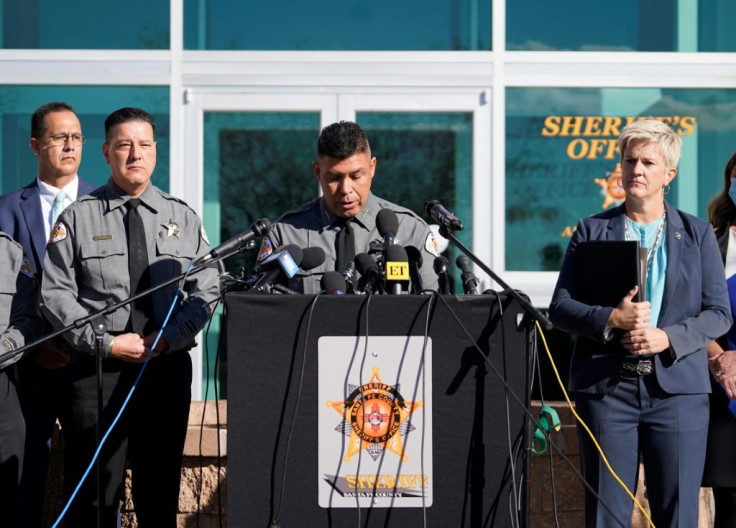 Santa Fe county sheriff Adan Mendoza, with district attorney Mary Carmack-Altwies (R), speaks to press on October 27, 2021, about the criminal probe into the fatal shooting of Halyna Hutchins on the set of the movie "Rust," in Santa Fe, New Mexico