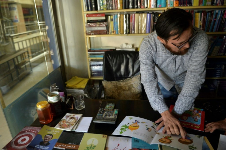 Abdul Amin Hossaini, a middle-aged bookseller, says business was good before the Taliban took over the Afghan capital