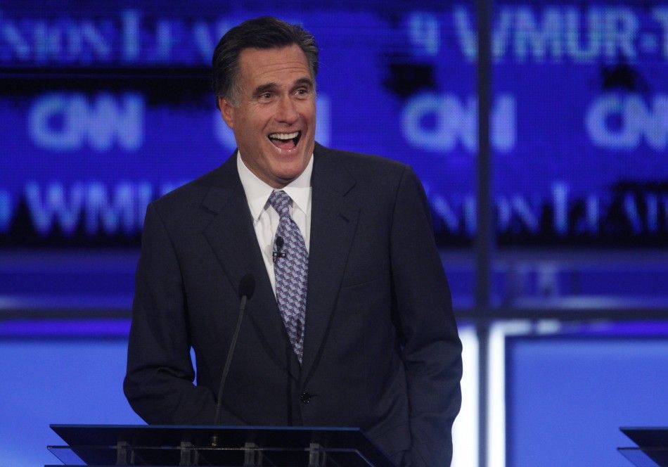 Former Massachusetts Governor Romney reacts during first New Hampshire debate of the 2012 campaign at St. Anselms College in Manchester
