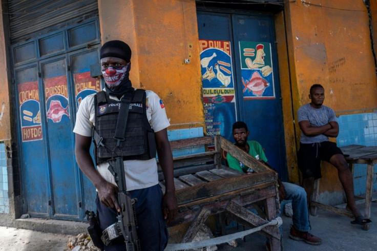 A Haitian National Police officer stands guard in Port-au-Prince, Haiti, on October 27, 2021
