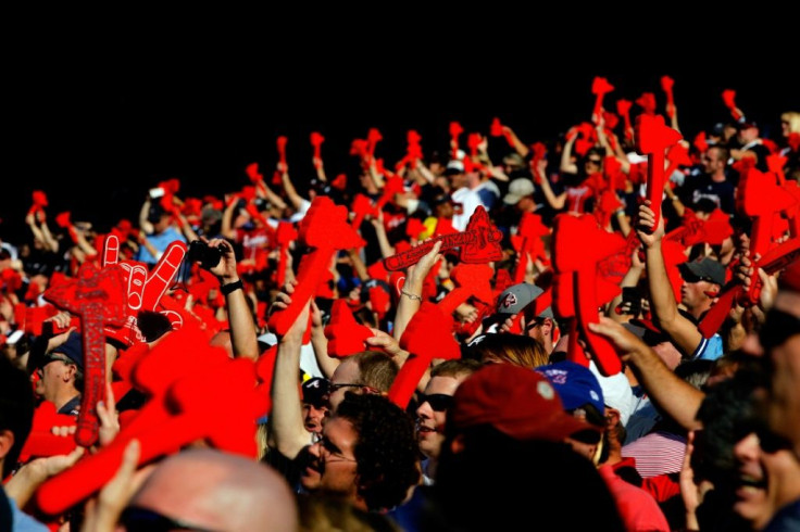 Atlanta Braves supporters deliver the Tomahawk Chop cheer to back the Major League Baseball club