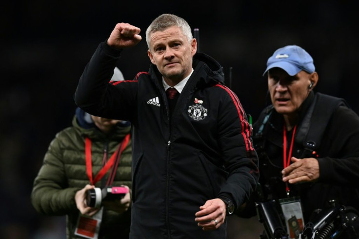 Manchester United manager Ole Gunnar Solskjaer celebrates after his side's 3-0 win against Tottenham