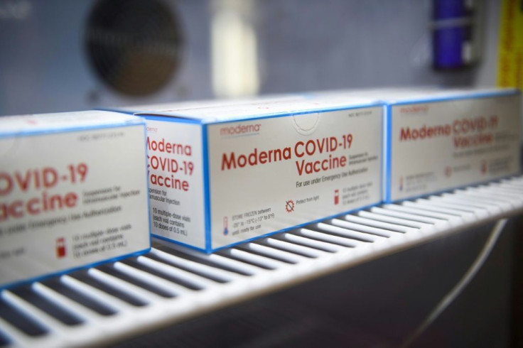 (FILES) This file photo taken on October 14, 2021 shows boxes containing vials of the Moderna Covid-19 vaccine stored at the Kedren Community Health Center in Los Angeles, California.Biotech companies benefit from new interest and financial investment ami