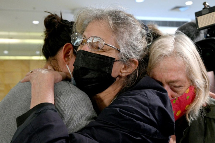 One family is emotional after being reunited at Sydney's airport as Australia's international border reopened for the first time since the  start of the pandemic