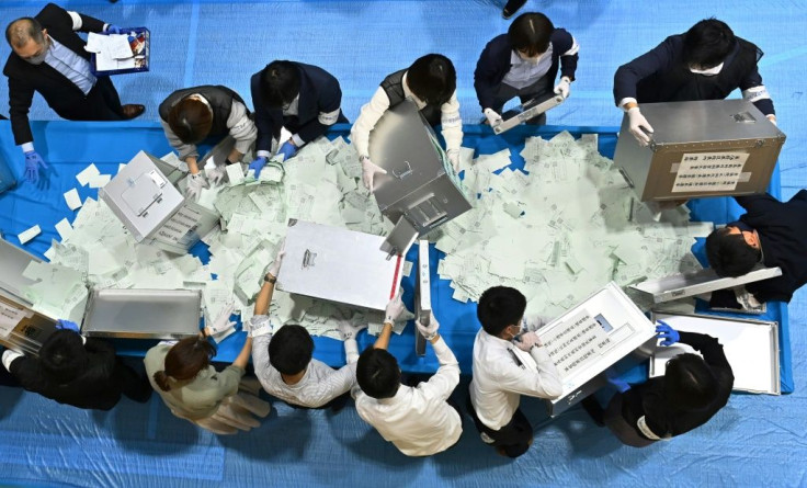 The Liberal Democratic Party (LDP) and its junior coalition partner won 293 of the 465 seats in parliament's lower house