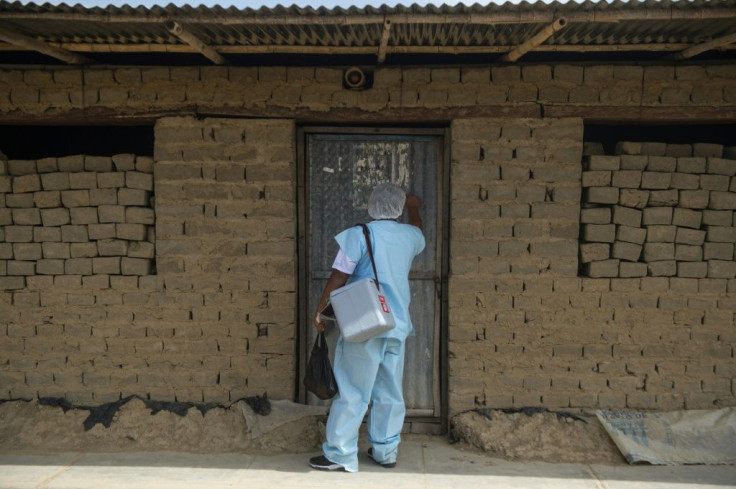 Health workers in Peru are going door to door in search of people to vaccinate