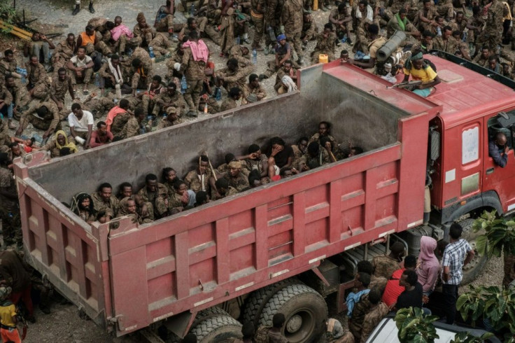 Wounded captive Ethiopian soldiers are shown arriving at the Mekele Rehabilitation Center in Mekele in early July