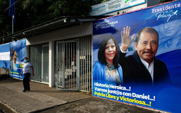 Nicaragua's President Daniel Ortega (campaign poster seen September 2021 in Managua) is seeking a fourth successive term, seven potential challengers among about 40 opposition figures under arrest