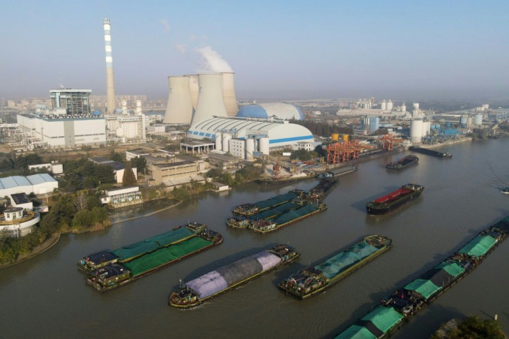 Barges carry coal on the Grand Canal to the Jiangsu Huadian Yangzhou Power Station at Yangzhou, in China's eastern Jiangsu province