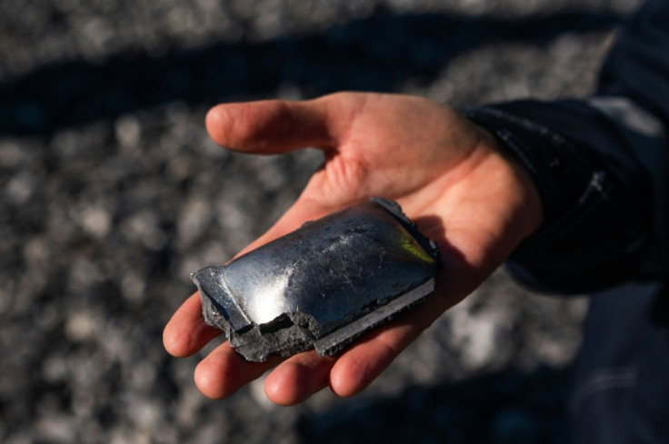 SSAB site manager Monica Quinteiro holds hot-briquetted iron