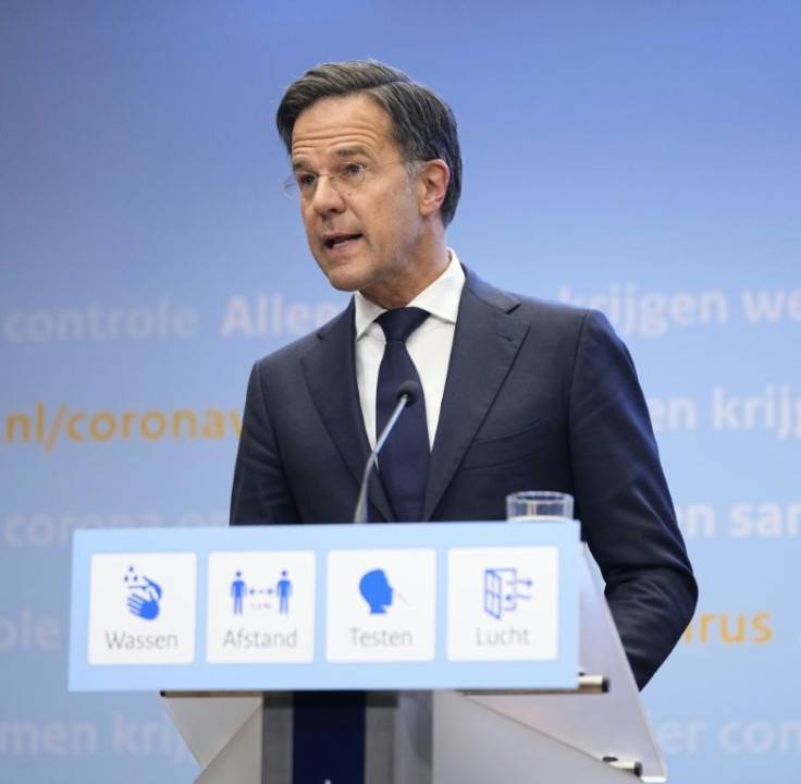 Outgoing Dutch Prime Minister Mark Rutte gives a press conference on the new coronavirus measures, in the Hague, on November 2, 2021