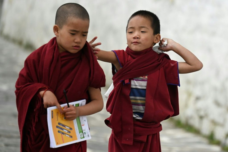 Young monks walk to class inside the Tawang monastery