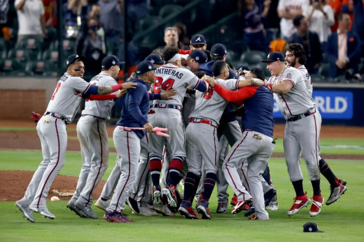 The Atlanta Braves celebrate after clinching victory over the Houston Astros to win the World Series on Tuesday