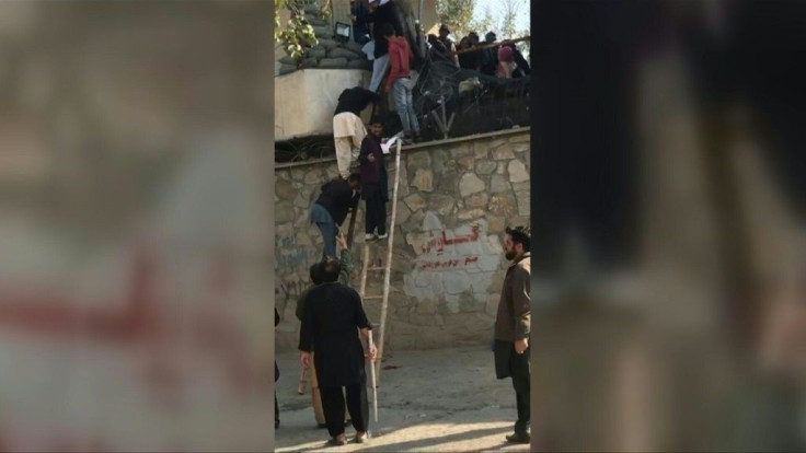 People fled a military hospital under attack on Tuesday