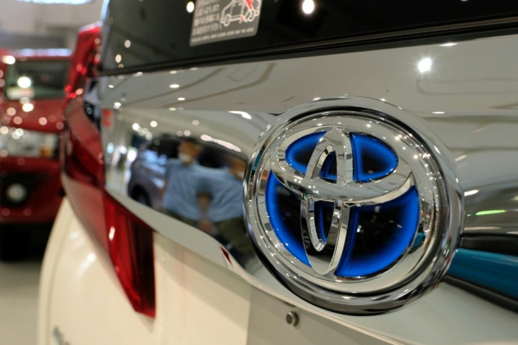 The campaign group gave Toyota and US-European firm Stellantis "F minus minus" grades for decarbonisation efforts