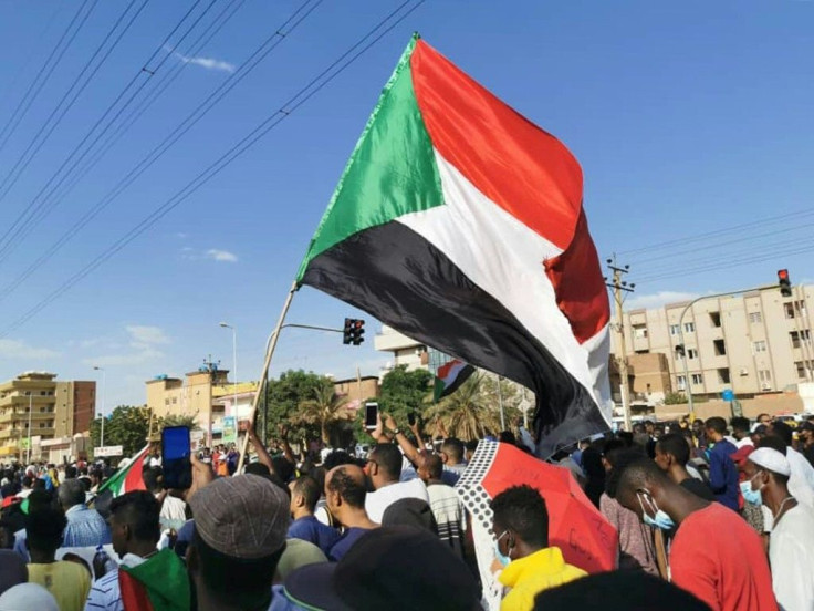Sudanese anti-coup protesters gather in a street of the capital Khartoum on October 30, 2021