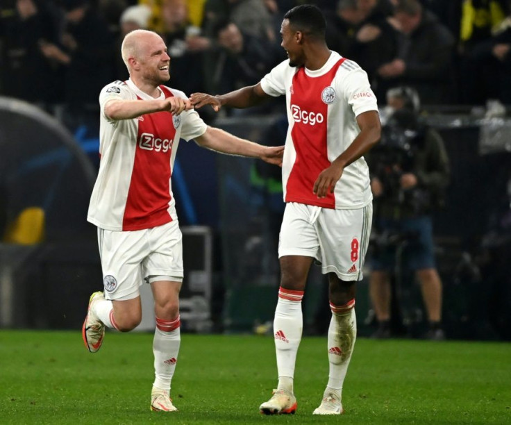 Ajax pair Davy Klaassen and Ryan Gravenberch celebrate their win against Borussia Dortmund
