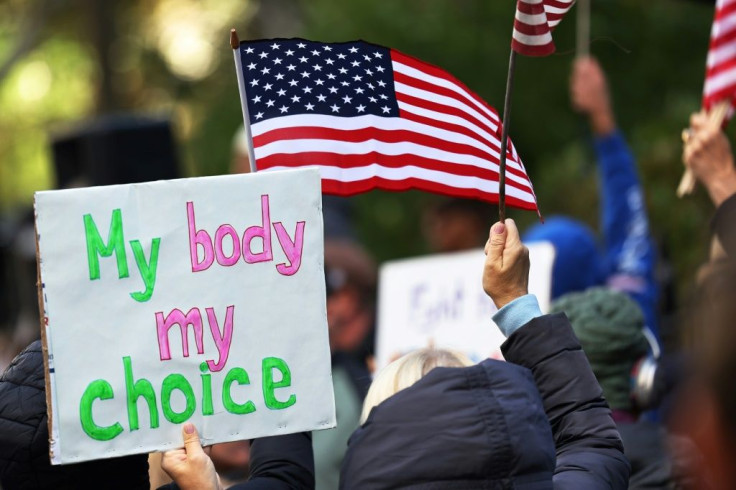 People gather to protest vaccine mandates for city workers at City Hall Park on November 03, 2021 in New York City