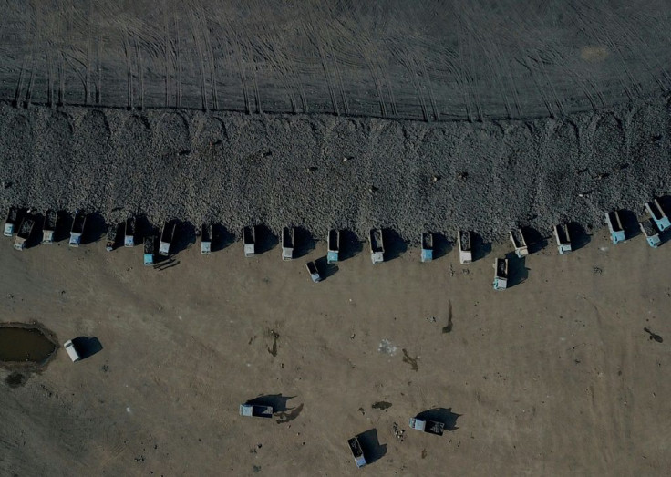 Aerial view of coal being loaded onto trucks near a mine in northern China's Datong. China generates about 60 percent of its energy from burning coal