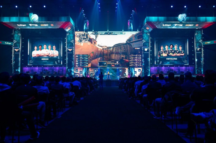 Supporters follow a match between team Heroic and team Virtus Pro at the Counter-Strike-Major event in Stockholm