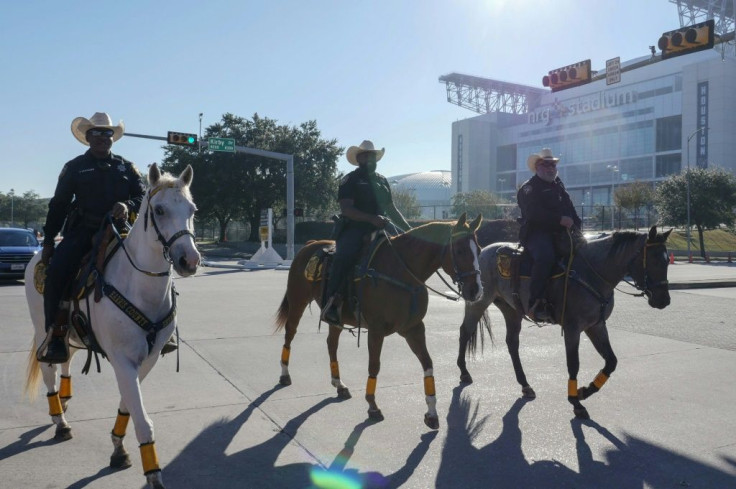 Police patrol around the NRG stadium in Houston