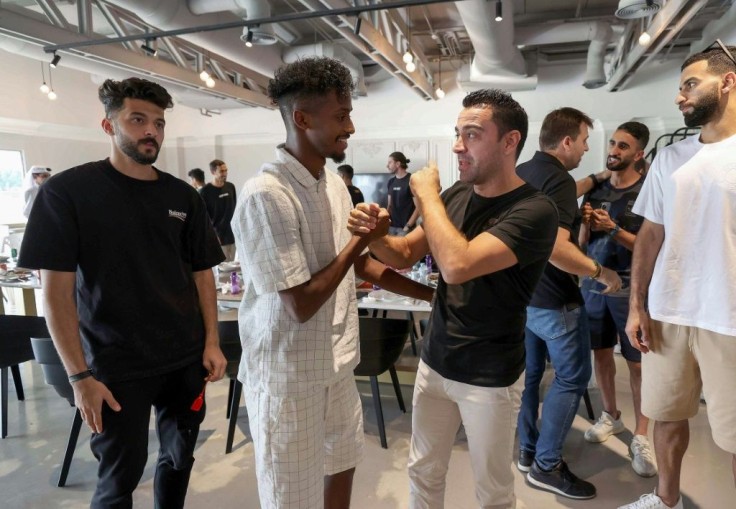 Xavi (third right) saying goodbye to his Al Sadd players on Frday