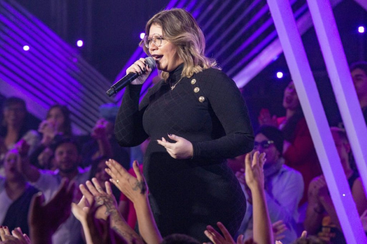 This handout picture released by Globo TV shows the late Brazilian singer Marilia Mendonca in September 2019 during a TV show called "Tamanho Familia"