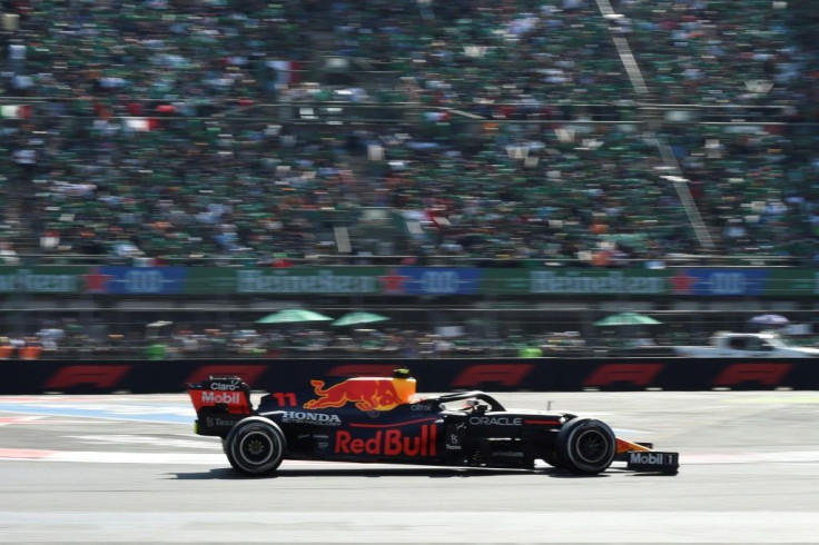 Cheered on: Red Bull's Mexican driver Sergio Perez racing in front of his home fans