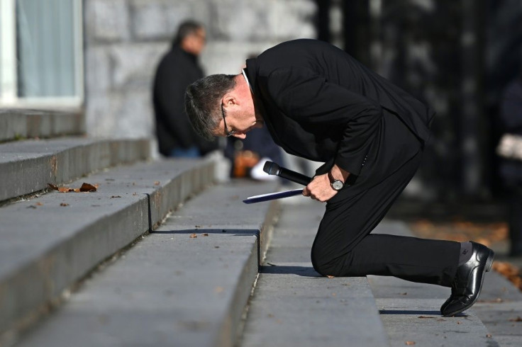 Archibshop of Rheims, Eric de Moulins-Beaufort, was among senior members of the clergy who kneeled and prayed as a sign of penance over the weekend