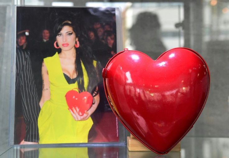 The custom-made red leather heart-shaped purse Amy Winehouse used at the 2007 Brit Awards is displayed at Julien's Auctions in Beverly Hills, California