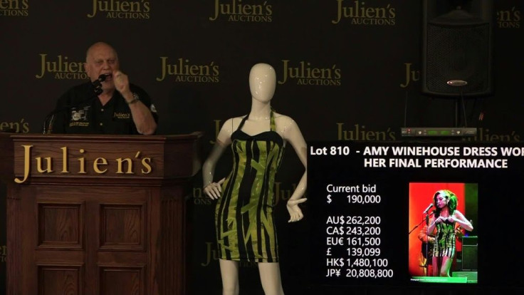 The dress singer Amy Winehouse wore for her final performance sold Sunday for $243,200, 16 times its estimated value, as part of a trove of memorabilia from the late diva's life auctioned in California.