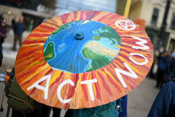 Tens of thousands of people thronged the streets of Glasgow on Saturday demanding faster action from governments after Greta Thunberg branded the summit "a failure"