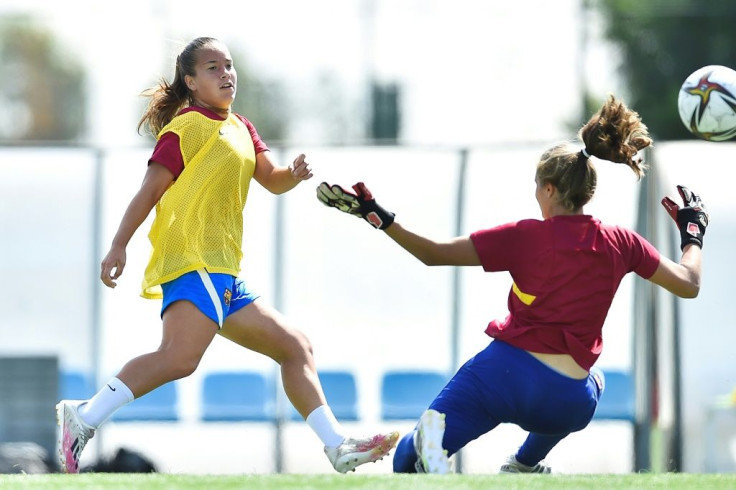 Claudia Riumallo Pineda (L) trains at the La Masia Residence