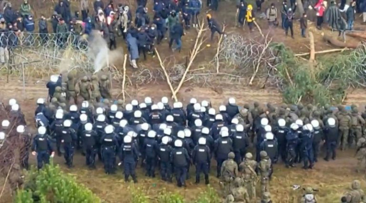Migrants clashing with security forces on the Polish-Belarus border in footage released by the Polish defence ministry