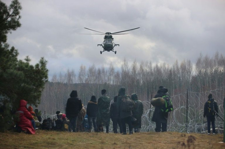 Up to 4,000 migrants are camped near Belarus's border with Poland