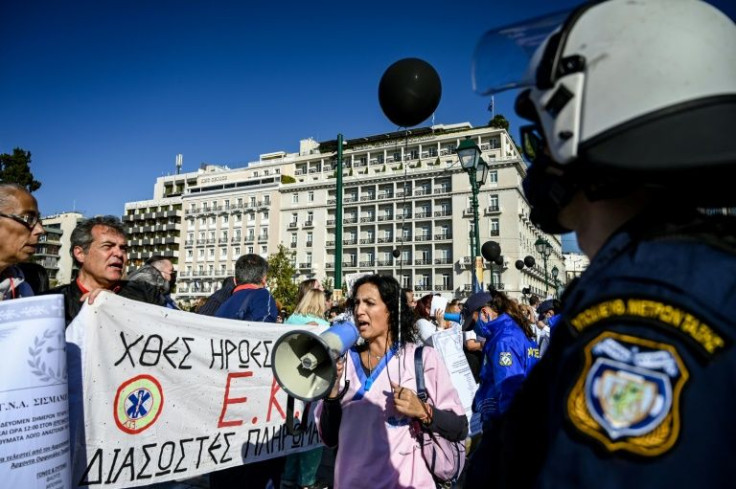Protesters demonstrate outside the Greek parliament against mandatory vaccines