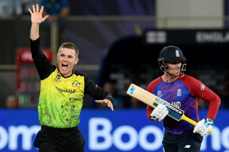 Spin wizard: Australia's Adam Zampa dismisses England's Jason Roy in a group game
