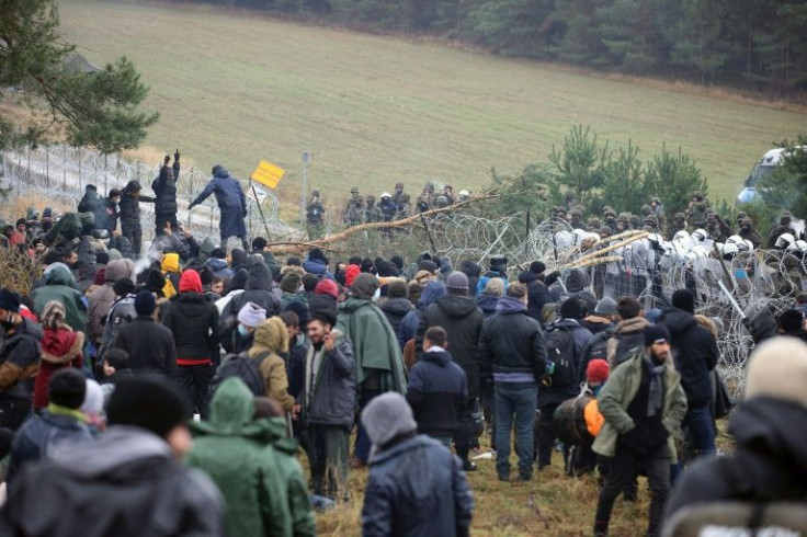 The migrants, mainly from the Middle East, have spent days in freezing temperatures on the border, blocked by rows of Polish border guards behind razor-wire