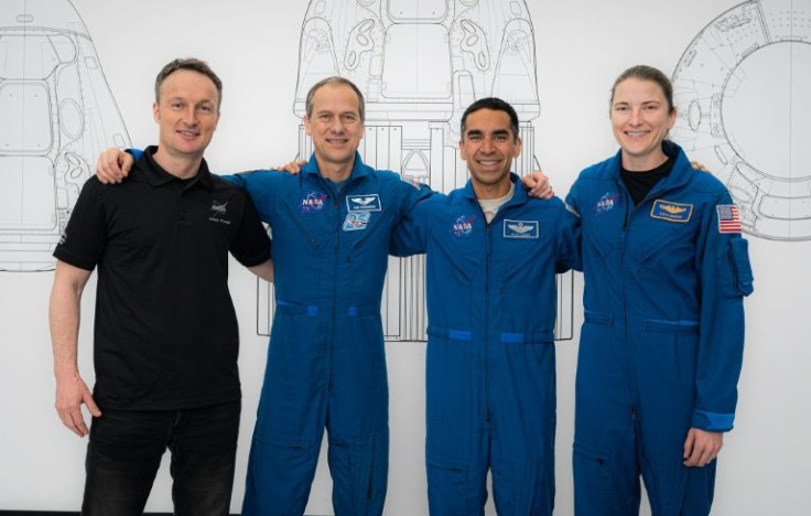 In this photo recieved by AFP on November 1, 2021, SpaceX Crew-3 astronauts (L-R) Matthias Maurer, Thomas Marshburn, Raja Chari and Kayla Barron pose for a portrait during preflight training at SpaceX headquarters in Hawthorne, California