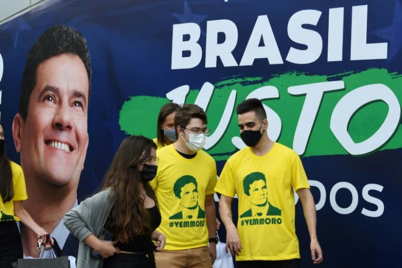 Supporters of former Brazilian judge Sergio Moro arrive at an event where he announced his affiliation with the Podemos party in Brasilia, on November 10, 2021