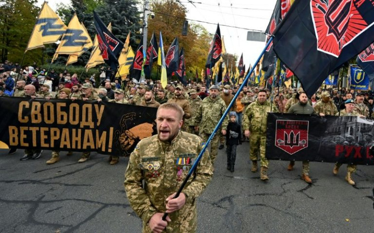 War veterans take part in a march of nationalist movements in Kiev on October 14, 2021