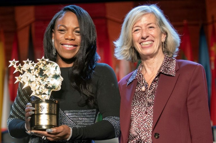 US teacher Keishia Thorpe poses with UNESCO Assistant Director-general for Education Stefania Giannini (R) after winning the Global Teacher Prize 2021 at the Unesco headquarters in Paris, on November 10, 2021