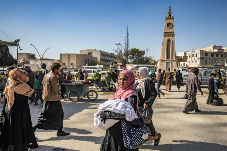 A few kilometres away from Al-Naim square, another infamous yet smaller roundabout has also regained its bustle, but for some a shadow still hangs over the place, known as 'clock-tower square'