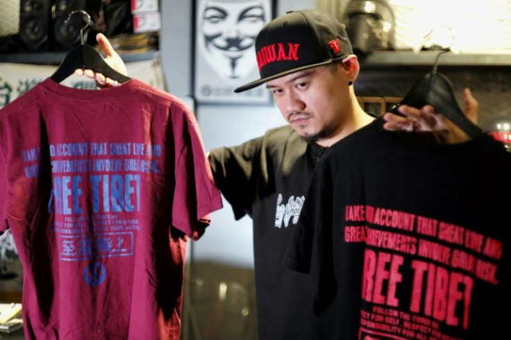 Liljay Chen shows off his pro-independence T-shirts