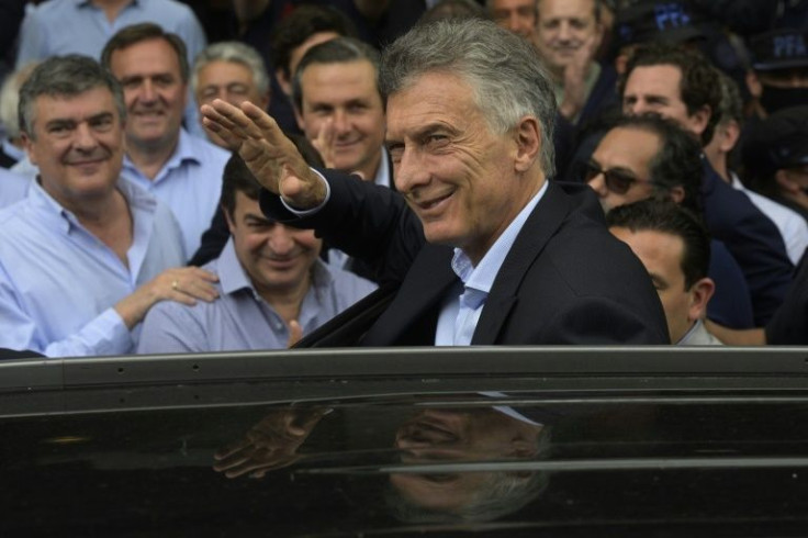 Former President Mauricio Macri's Juntos por el Cambio made great strides in September primary elections. He faces charges that his government spied on relatives of 44 sailors who died in the sinking of a navy submarine in 2017