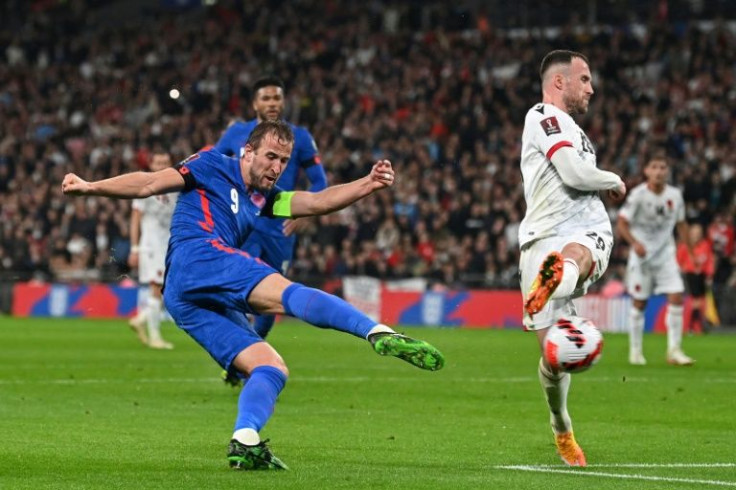 Captain fantastic: Harry Kane (left)scored a first-half hat-trick as England thrashed Albania