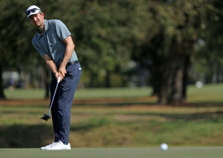 American Martin Trainer putts on the second hole on the way to the clubhouse lead in the second round of the US PGA Tour Houston Open